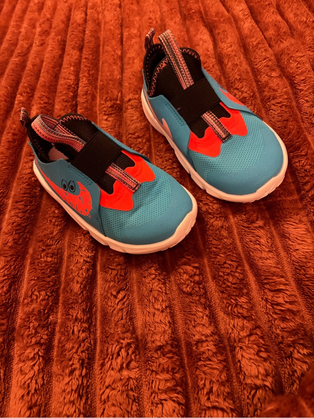 Nike Kids Teal and Orange Slip-On Sneakers